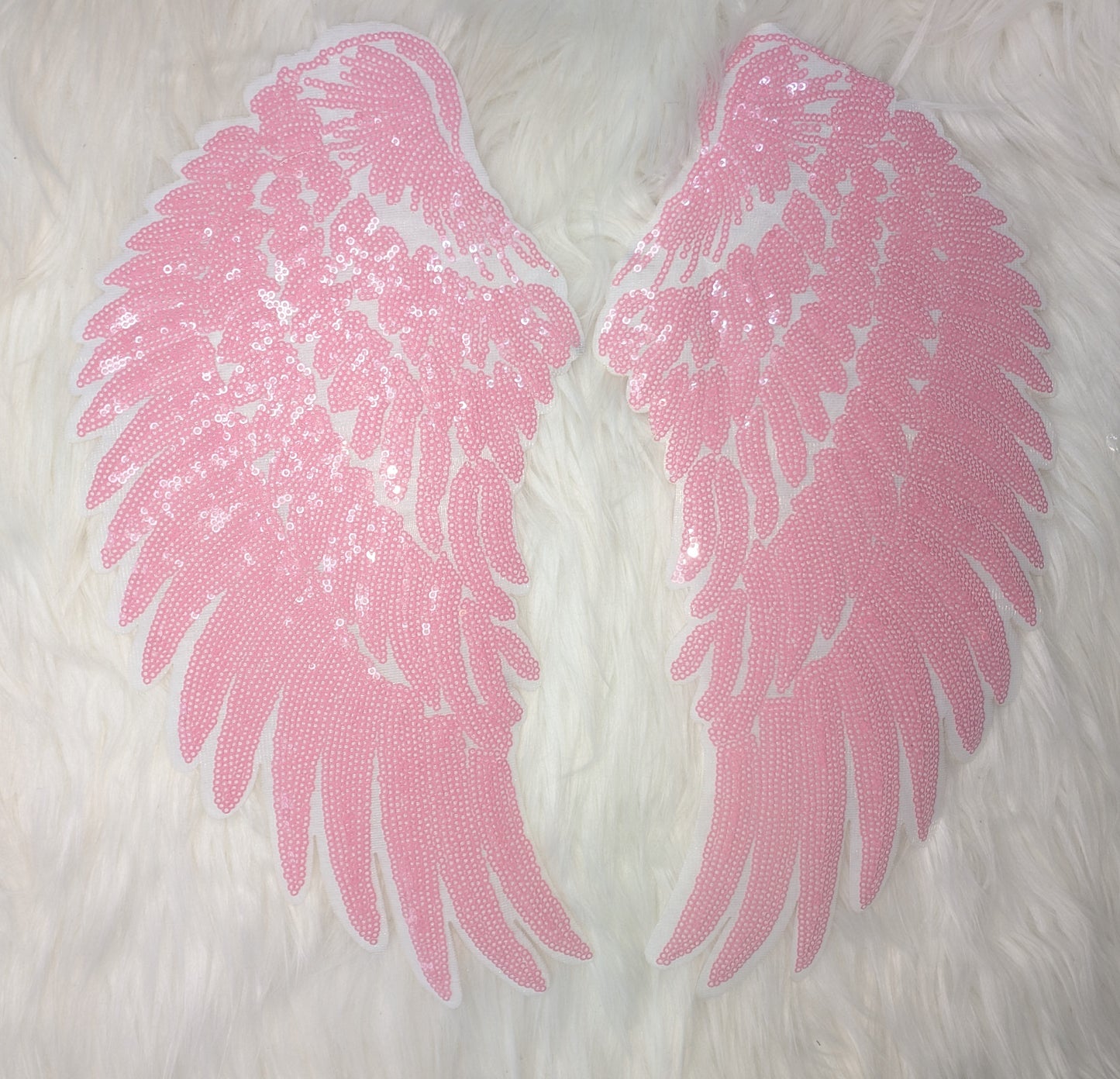 Large pink wings